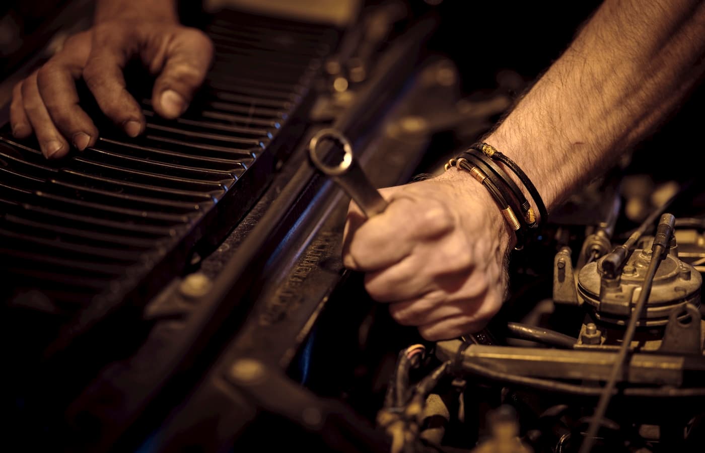 Experienced mechanic at Encinas Automotive working on a vehicle